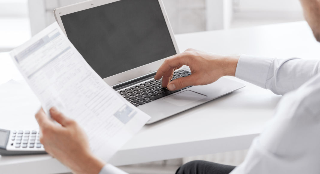 miling businessman working in office