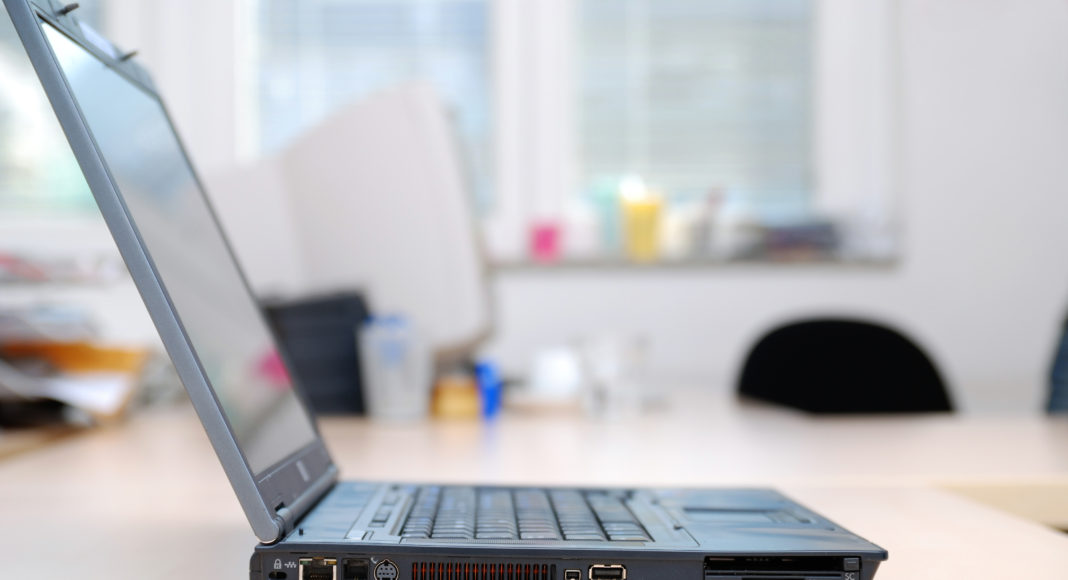thin laptop on office desk