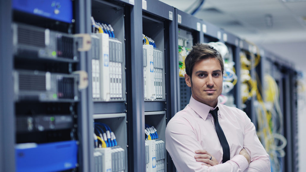 young it engeneer in datacenter server room