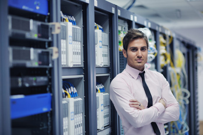 young it engeneer in datacenter server room