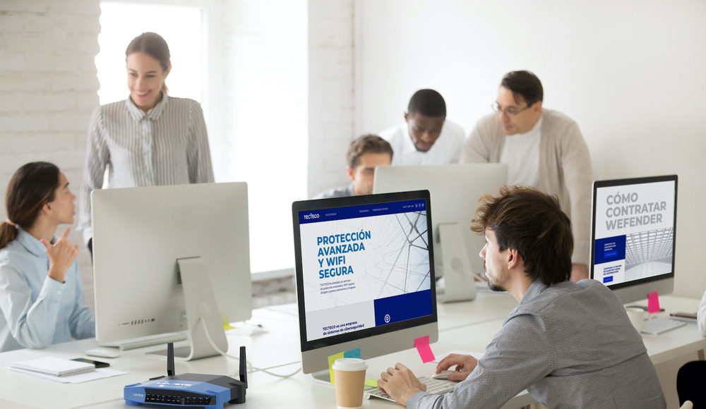Diverse corporate employees group working together using compute WEFENDER - GTI - Newsbook - Tecteco - Alianza -seguridad -Tai Editorial - España